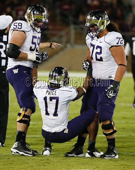 2013Stanford-Wash-066.JPG - Oct. 5, 2013; Stanford, CA, USA; Washington Huskies quarterback Keith Price (17) is helped up by offensive linemen Ben Riva (59) and Micah Hatchie (72) following a sack against the Stanford Cardinal at  Stanford Stadium. Stanford defeated Washington 31-28.